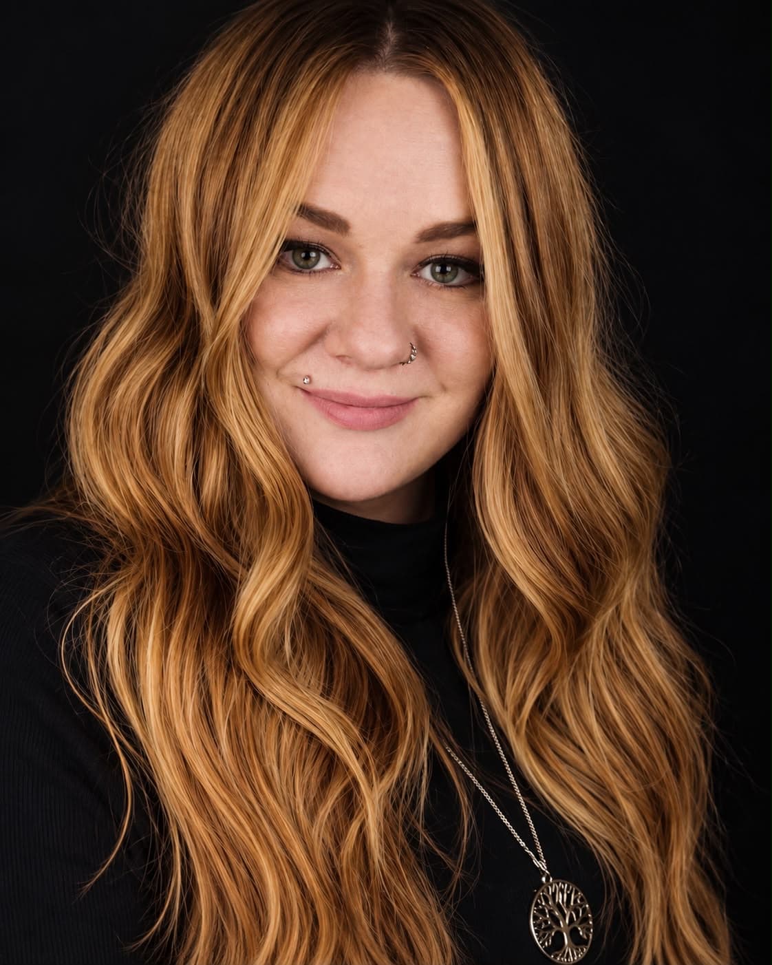 Steph Walsh, founder of The Mirror Muse, with long dimensional waves